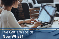 Woman at Computer with word "I've Got a Website, Now What?